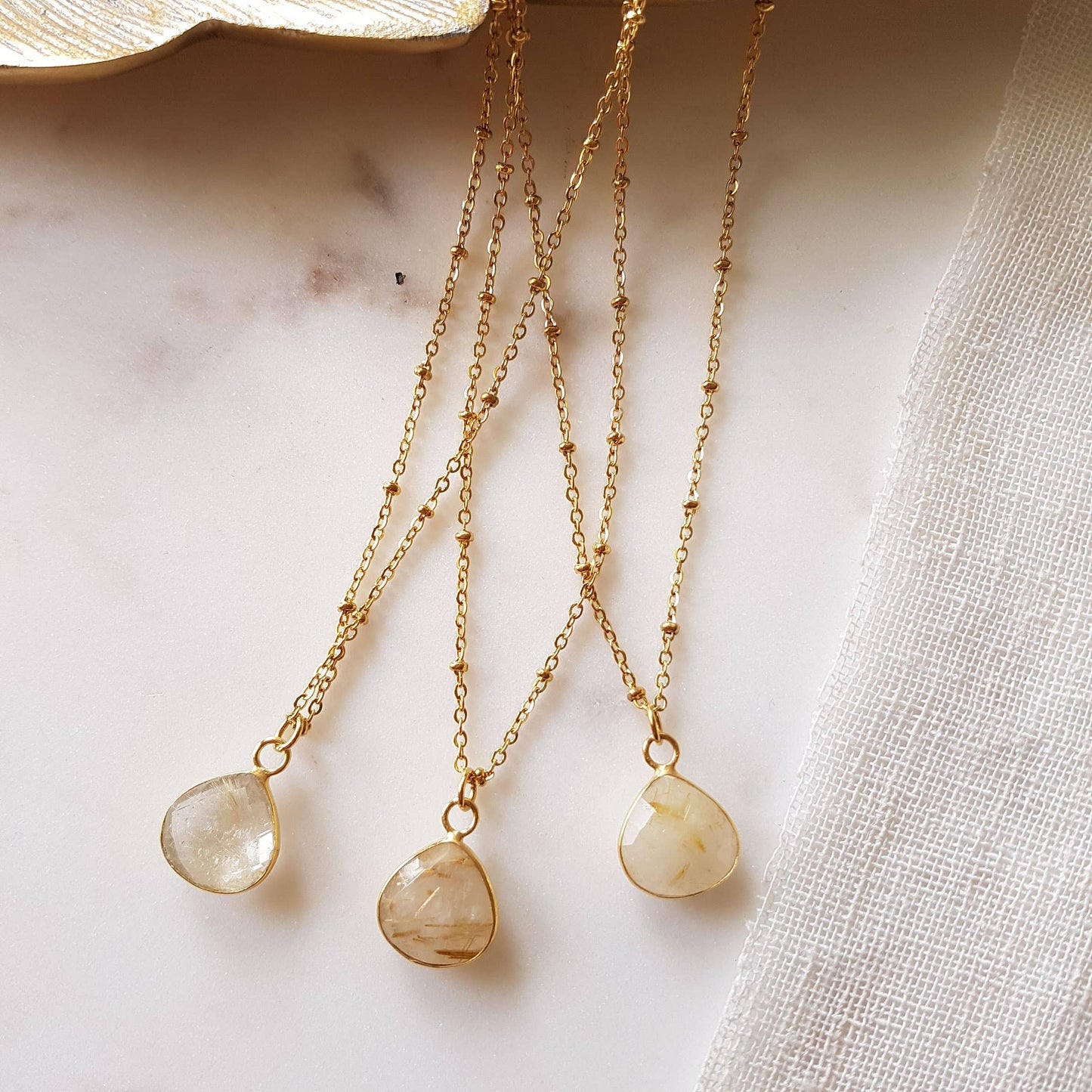 collana quarzo rutilato forma goccia montatura dorata